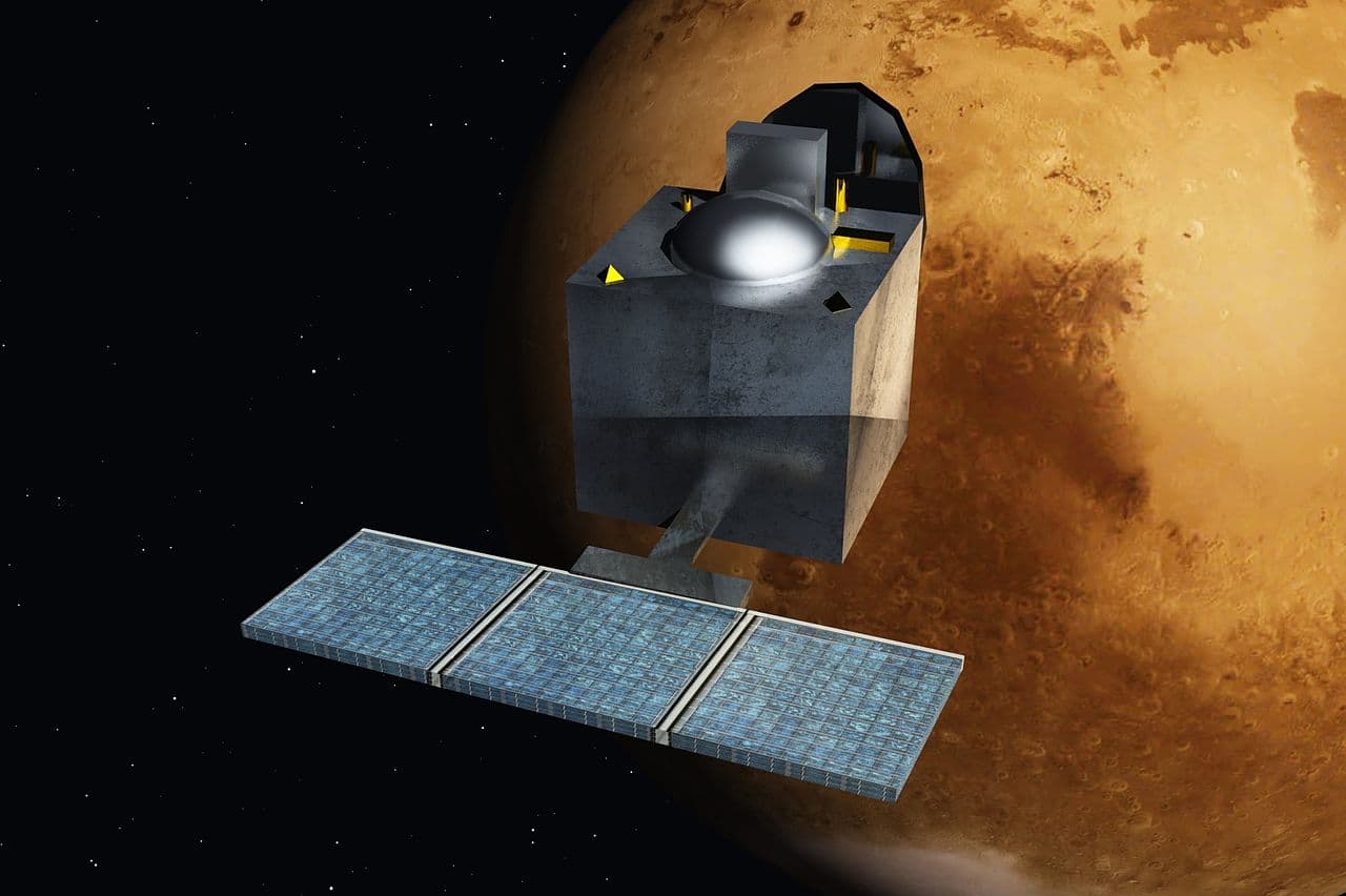 Artist's concept of India's Mars Orbiter Mission (Mangalyaan) orbiting the red planet
