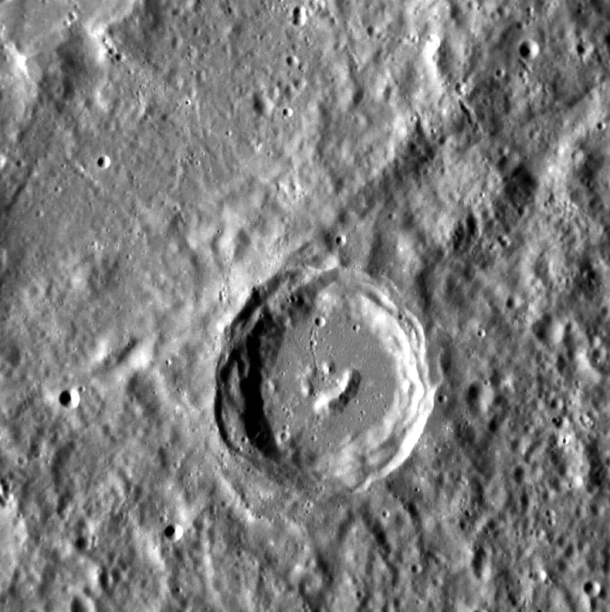 Close-up of a crater on Mercury showing bright hollows on the surface