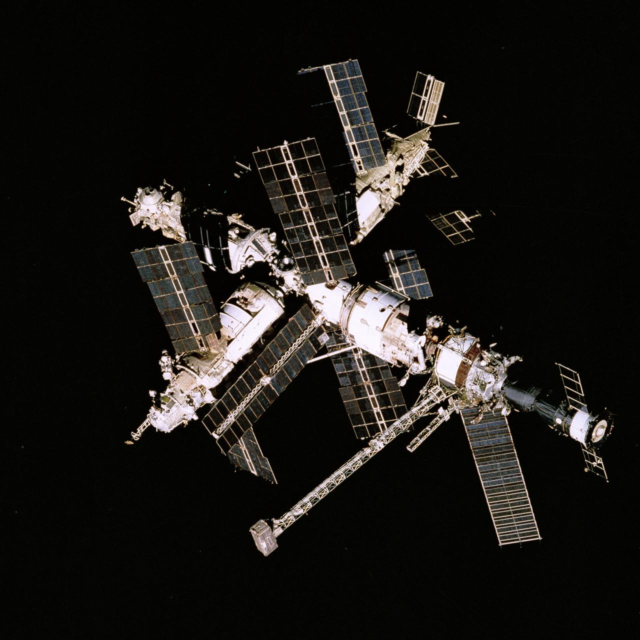 The Space Shuttle Atlantis docked to Mir during STS-71, symbolizing the brief US-Russia space partnership of the 1990s
